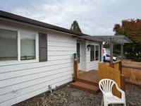 white siding back entry