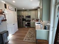 Soft Sage Green Kitchen Cabinet Painting