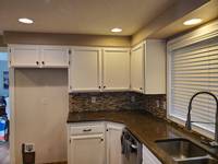 Professionally Painted White Kitchen Cabinets