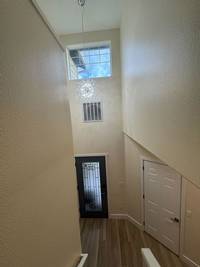 high-ceiling-stairwell-interior-painting