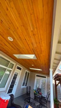 stained-wood-porch-ceiling-white-trim