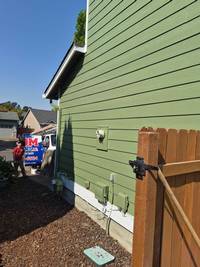 green-house-siding-exterior-painting