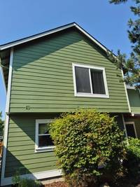 green-two-story-house-exterior-painting