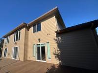 stone-home-front-exterior-painting.jpg warm-brown-house-siding-painting