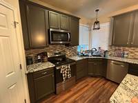 dark-grey-kitchen-cabinet-refinishing