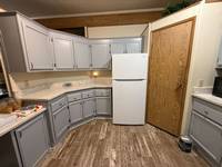 light-grey-painted-kitchen-cabinets-corner