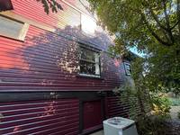 red-home-exterior-side-painting
