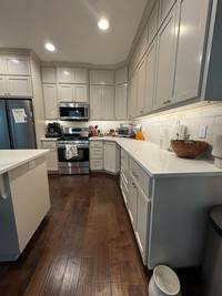 Newly painted white cabinets