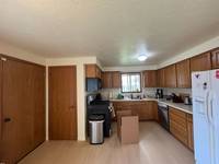 Full set of kitchen cabinets included. Cleaning, sanding, priming, and finish coats.