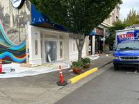 The facade was fully masked and protected before paint application to ensure clean lines and avoid overspray.