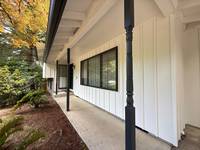 Complete painting of exterior siding (board and batten)