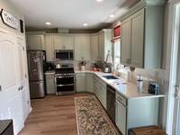 Another angle showing how the new white finish helps open up the space