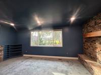Final wide shot showcasing the finished space with a rich, cohesive color and updated look.