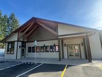 Front view of the Eddyville Fire Station showcasing the completed exterior repaint and updated modern finish.