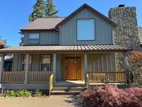 Full Front Exterior & Stone Chimney